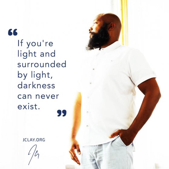 inspirational quote by jclay in white shirt about light