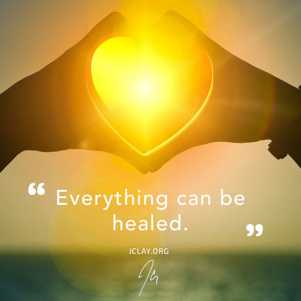 motivational quote by jclay about healing over an image of a heart sun hands