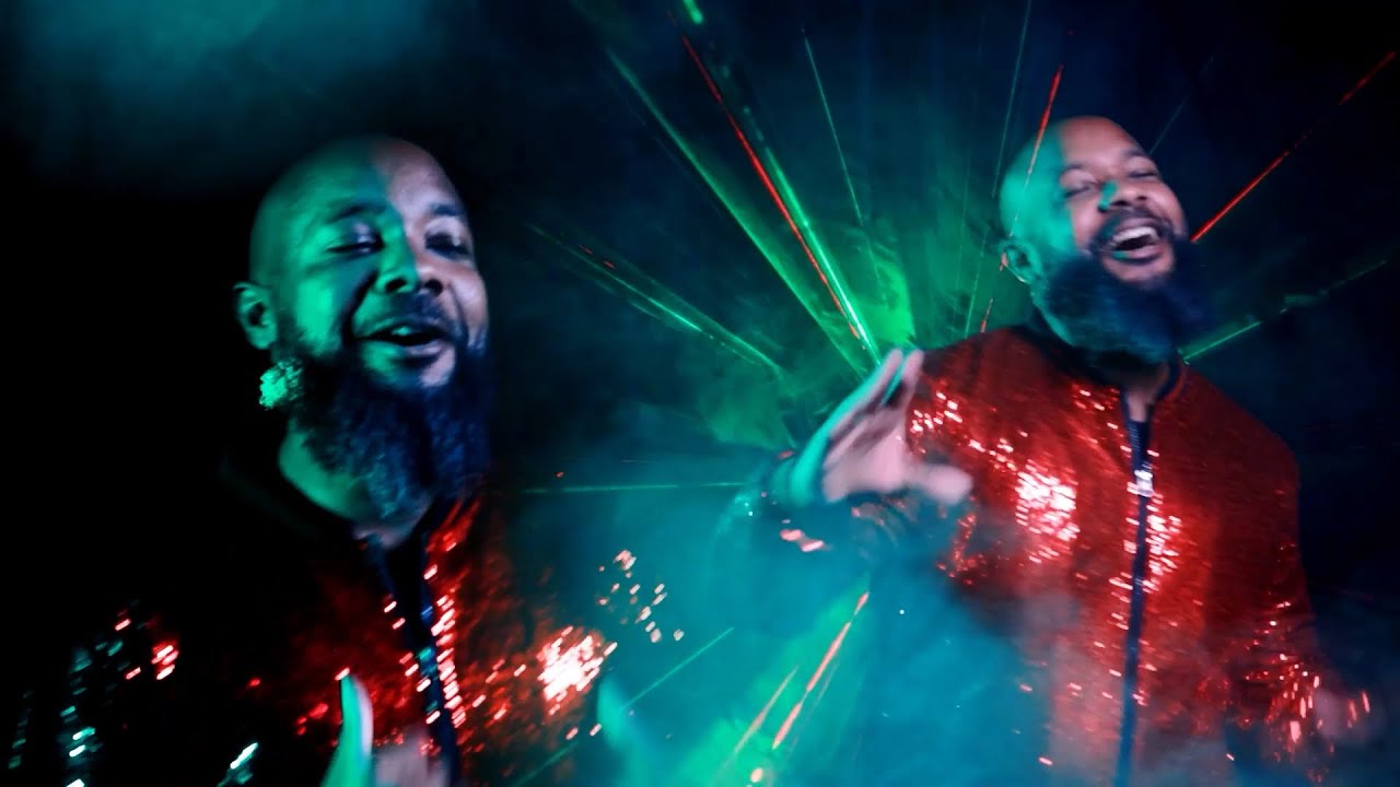 JClay in bright lights and colors for I And You music video