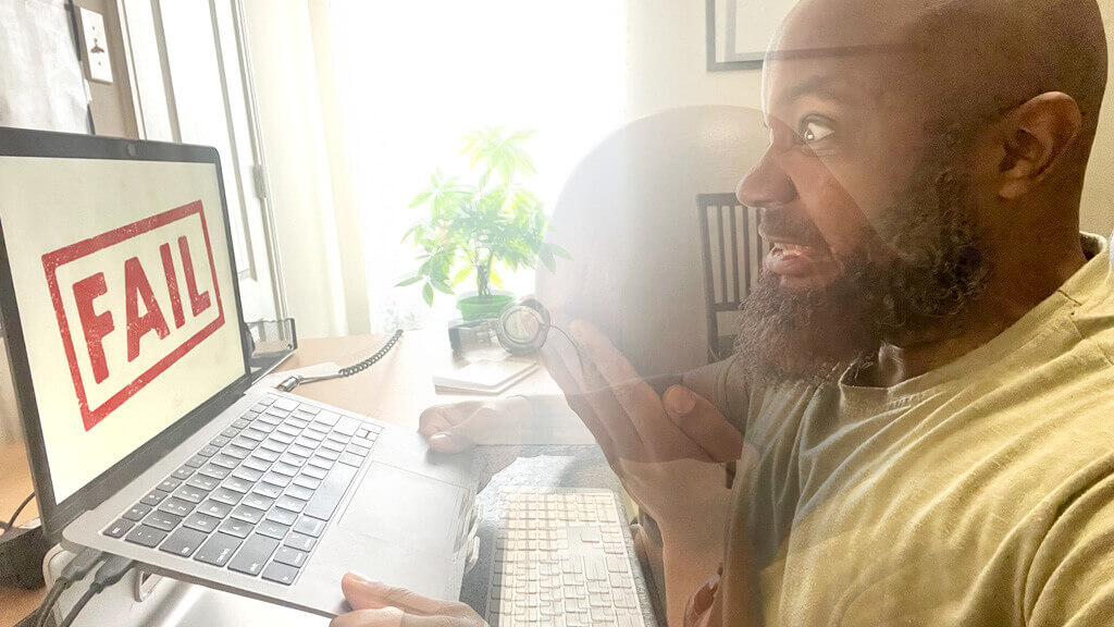 jclay looking frustrated at a failing computer